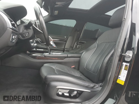 2016 BMW 7 Series 750i with VIN WBA7F0C56GGL99533, listed as a Copart auction lot 59091045 with 124,624 mi miles and Clean title. Bid and sale history available at DreamBid. Image 7.