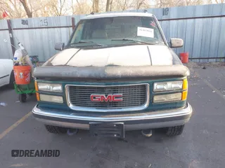 1997 GMC Suburban z VIN 1GKGK26J6VJ758001, wystawiony jako IAAI lot #41457050 z przebiegiem 164 337 mil mil oraz . Historia ofert i sprzedaży dostępna na DreamBid. Obrazek 6.