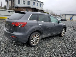 2013 Mazda CX-9 Grand Touring with VIN JM3TB3DV0D0401639, listed as a Copart auction lot 52300985 with 131,857 mi miles and Clean title. Bid and sale history available at DreamBid. Image 3.