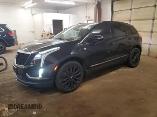 2021 Cadillac XT5 AWD Sport with VIN 1GYKNHRS1MZ103033, listed as a Copart auction lot 58586425 with 65,229 mi miles and Salvage title. Bid and sale history available at DreamBid. Image 1.