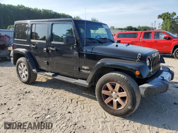 2015 Jeep Wrangler Unlimited Sahara with VIN 1C4HJWEGXFL744852, listed as a Copart auction lot 60246145 with 135,496 mi miles and Salvage title. Bid and sale history available at DreamBid. Image 4.
