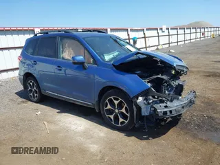 2015 Subaru Forester XT Touring with VIN JF2SJGWC7FH448103, listed as a IAAI auction lot 42182003 with 157,272 mi miles and . Bid and sale history available at DreamBid. Image 1.