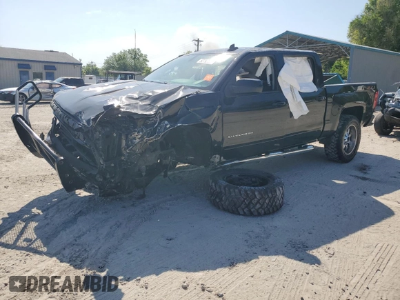 2018 Chevrolet Silverado 1500 LT with VIN 3GCUKRECXJG503244, listed as a Copart auction lot 52792825 with 107,029 mi miles and Salvage Title. Bid and sale history available at DreamBid. Image 1.