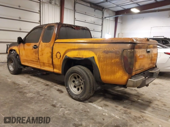 2011 GMC Canyon SLE1 with VIN 1GTJ6MFE0B8136887, listed as a IAAI auction lot 41768986 with 154,573 mi miles. Bid and sale history available at carsss.com. Image 3.