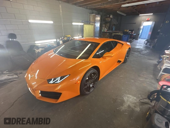 2016 Lamborghini Huracan z VIN ZHWUC2ZFXGLA04796, wystawiony jako Copart lot #45041295 z przebiegiem 23 094 mil mil oraz Czysty tytuł • Clean title. Historia ofert i sprzedaży dostępna na DreamBid. Obrazek 2.