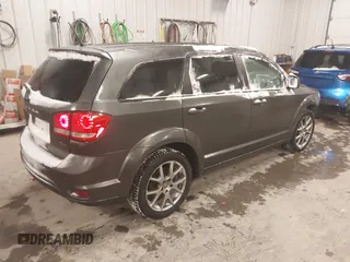 2016 Dodge Journey R/T with VIN 3C4PDCEGXGT212878, listed as a IAAI auction lot 41383369 with 227,652 mi miles and . Bid and sale history available at carsss.com. Image 4.
