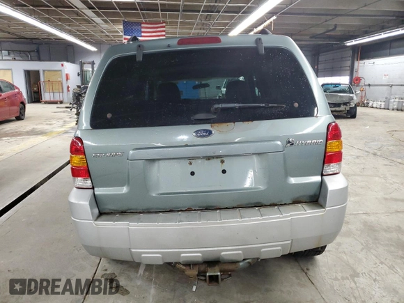 2007 Ford Escape Hybrid z VIN 1FMCU59H47KB00703, wystawiony jako Copart lot #51688245 z przebiegiem 194 296 mil mil oraz Szkoda całkowita • Salvage title. Historia ofert i sprzedaży dostępna na DreamBid. Obrazek 6.