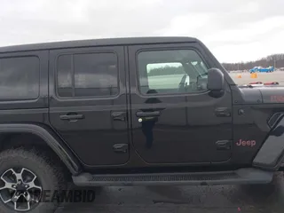 2021 Jeep Wrangler Unlimited Rubicon with VIN 1C4HJXFG8MW775419, listed as a IAAI auction lot 41797178 with 56,166 mi miles. Bid and sale history available at carsss.com. Image 14.