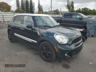 2013 MINI Countryman S ALL4 z VIN WMWZC5C58DWP31357, wystawiony jako Copart lot #51438035 z przebiegiem 98 138 mil mil oraz Szkody całkowita. Historia ofert i sprzedaży dostępna na DreamBid. Obrazek 4.