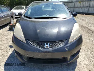 2011 Honda Fit Sport with VIN JHMGE8H57BC024827, listed as a Copart auction lot 59704194 with 146,316 mi miles and Salvage Title. Bid and sale history available at DreamBid. Image 5.