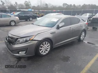 2014 Kia Optima EX z VIN 5XXGN4A75EG290132, wystawiony jako IAAI lot #41292706 z przebiegiem 155 793 mil mil oraz . Historia ofert i sprzedaży dostępna na DreamBid. Obrazek 2.
