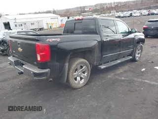 2016 Chevrolet Silverado 1500 LTZ with VIN 3GCUKSEC2GG349340, listed as a IAAI auction lot 41722693 with 122,321 mi miles and . Bid and sale history available at DreamBid. Image 4.