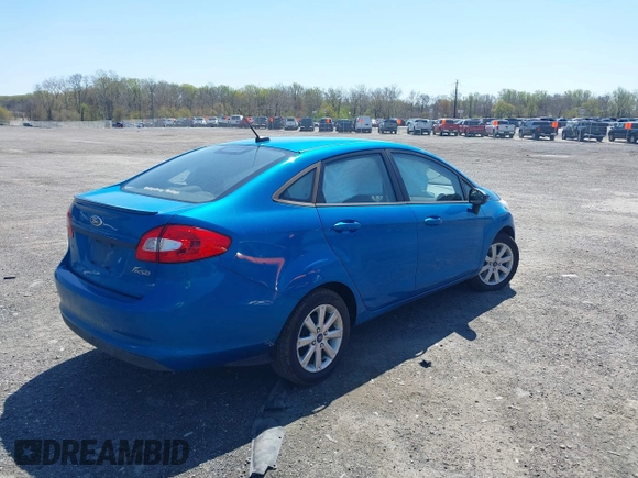 2012 Ford Fiesta SE with VIN 3FADP4BJXCM125881, listed as a IAAI auction lot 42044455 with 156,804 mi miles. Bid and sale history available at carsss.com. Image 4.