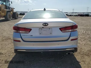 2019 Kia Optima LX z VIN 5XXGT4L31KG329150, wystawiony jako Copart lot #59225935 z przebiegiem 58 253 mil mil oraz Szkoda całkowita • Salvage title. Historia ofert i sprzedaży dostępna na DreamBid. Obrazek 6.