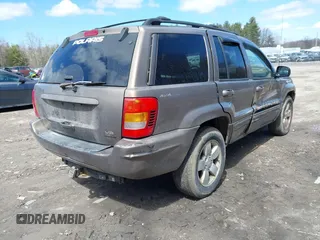 2001 Jeep Grand Cherokee Limited with VIN 1J4GW58N71C587088, listed as a IAAI auction lot 41973901 with 207,075 mi miles. Bid and sale history available at carsss.com. Image 4.