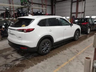 2022 Mazda CX-9 Sport z VIN JM3TCBBYXN0603653, wystawiony jako IAAI lot #42325893 z przebiegiem 57 480 mil mil oraz . Historia ofert i sprzedaży dostępna na DreamBid. Obrazek 4.