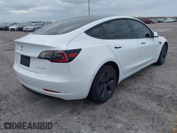 2021 Tesla Model 3 Long Range z VIN 5YJ3E1EB7MF979988, wystawiony jako IAAI lot #40893463 z przebiegiem 38 230 mil mil oraz . Historia ofert i sprzedaży dostępna na DreamBid. Obrazek 4.