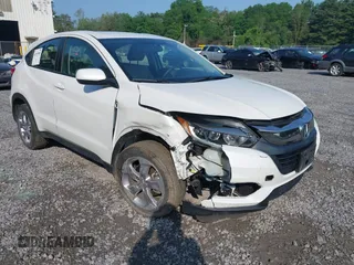 2021 Honda HR-V LX with VIN 3CZRU6H3XMM716804, listed as a IAAI auction lot 42559509 with 19,286 mi miles and . Bid and sale history available at DreamBid. Image 1.