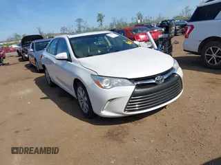2015 Toyota Camry XLE with VIN 4T1BF1FK1FU977554, listed as a IAAI auction lot 42083589 with 104,811 mi miles and . Bid and sale history available at DreamBid. Image 1.
