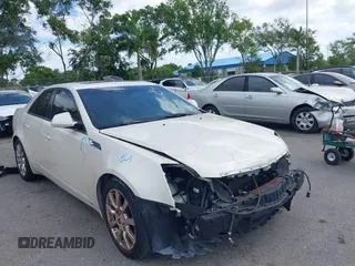 2008 Cadillac CTS RWD with VIN 1G6DV57V880128535, listed as a IAAI auction lot 39097540 with 153,140 mi miles and . Bid and sale history available at DreamBid. Image 1.