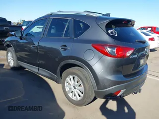 2016 Mazda CX-5 Touring with VIN JM3KE2CY4G0695947, listed as a IAAI auction lot 41824490 with 162,191 mi miles and . Bid and sale history available at carsss.com. Image 3.