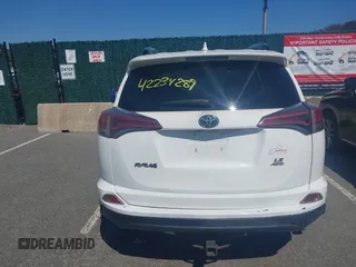 2017 Toyota RAV4 LE with VIN JTMBFREV4HJ112595, listed as a IAAI auction lot 42234289 with 207,379 mi miles and . Bid and sale history available at carsss.com. Image 16.