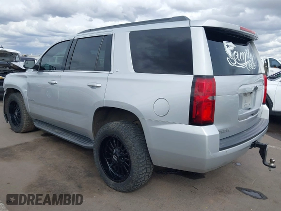 2018 Chevrolet Tahoe LT with VIN 1GNSCBKC2JR115318, listed as a IAAI auction lot 41809253 with 107,217 mi miles and . Bid and sale history available at DreamBid. Image 3.