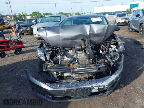 2016 Volkswagen Passat SE z VIN 1VWBT7A32GC016577, wystawiony jako IAAI lot #42334269 z przebiegiem 128 006 mil mil oraz . Historia ofert i sprzedaży dostępna na DreamBid. Obrazek 12.