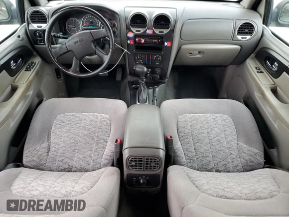 2003 GMC Envoy SLT with VIN 1GKDS13S832408371, listed as a Copart auction lot 44166715 with 208,256 mi miles and Salvage Title. Bid and sale history available at carsss.com. Image 8.