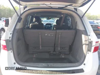 2012 Honda Odyssey EX-L with VIN 5FNRL5H62CB010054, listed as a IAAI auction lot 42040117 with 189,566 mi miles and . Bid and sale history available at carsss.com. Image 18.
