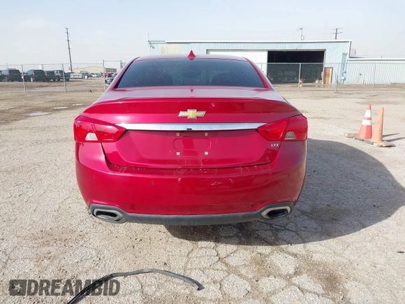 2014 Chevrolet Impala LTZ with VIN 1G1145SL0EU169876, listed as a IAAI auction lot 41696439 with 121,453 mi miles and . Bid and sale history available at DreamBid. Image 17.