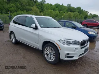 2016 BMW X5 xDrive40e z VIN 5UXKT0C52G0S74977, wystawiony jako IAAI lot #42352965 z przebiegiem 121 606 mil mil oraz . Historia ofert i sprzedaży dostępna na DreamBid. Obrazek 1.