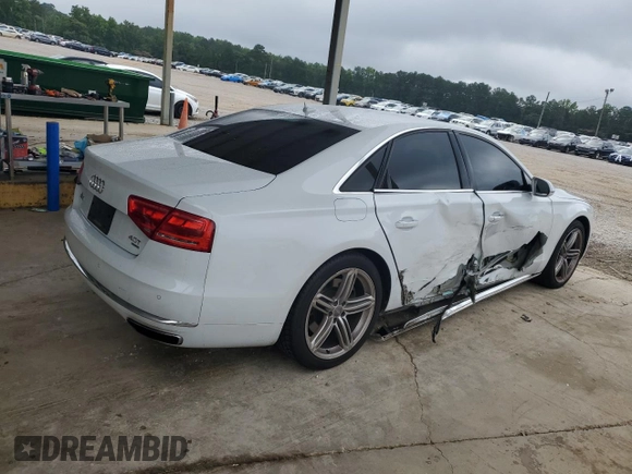 2013 Audi A8 4.0L with VIN WAUA2AFD9DN026942, listed as a Copart auction lot 60319565 with 122,341 mi miles and Salvage title. Bid and sale history available at DreamBid. Image 3.