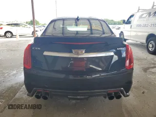 2019 Cadillac CTS-V z VIN 1G6A15S65K0126084, wystawiony jako Copart lot #70317924 z przebiegiem Nie podano mil oraz Nie do naprawy. Historia ofert i sprzedaży dostępna na DreamBid. Obrazek 6.