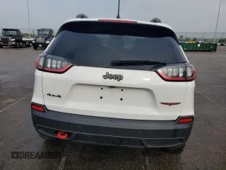 2021 Jeep Cherokee Trailhawk with VIN 1C4PJMBX7MD209604, listed as a Copart auction lot 59289355 with 44,627 mi miles and Salvage title. Bid and sale history available at DreamBid. Image 6.