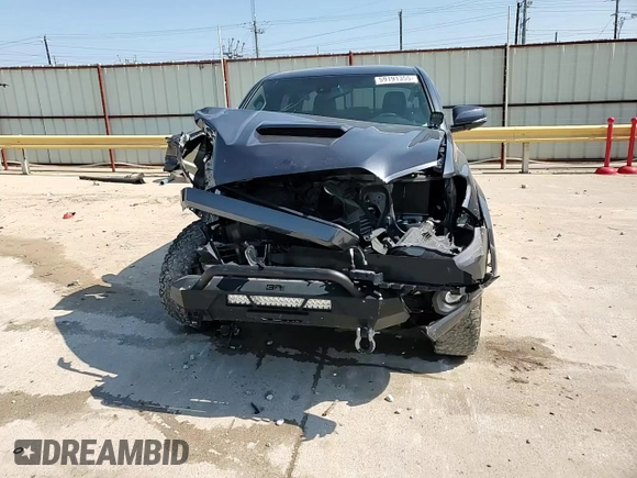 2021 Toyota Tacoma SR with VIN 3TMCZ5AN9MM451389, listed as a Copart auction lot 59191355 with 26,427 mi miles and Salvage title. Bid and sale history available at DreamBid. Image 14.