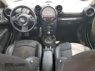 2013 MINI Countryman S with VIN WMWZC3C58DWP21965, listed as a Copart auction lot 61161735 with 142,797 mi miles and Salvage title. Bid and sale history available at DreamBid. Image 8.