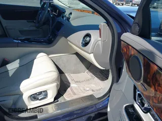 2014 Jaguar XJ Portfolio with VIN SAJWA2GZ4E8V60251, listed as a IAAI auction lot 41778702 with 45,180 mi miles and . Bid and sale history available at DreamBid. Image 5.