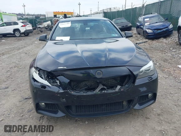 2013 BMW 5 Series 535i xDrive with VIN WBAFU7C51DDU75974, listed as a IAAI auction lot 41837789 with 216,394 mi miles and . Bid and sale history available at carsss.com. Image 6.
