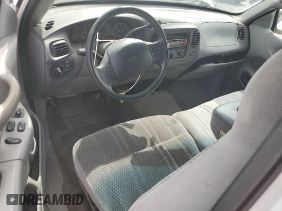 1998 Ford F-150 with VIN 2FTZX1766WCA27840, listed as a Copart auction lot 56186495 with 147,127 mi miles and Clean title. Bid and sale history available at DreamBid. Image 8.