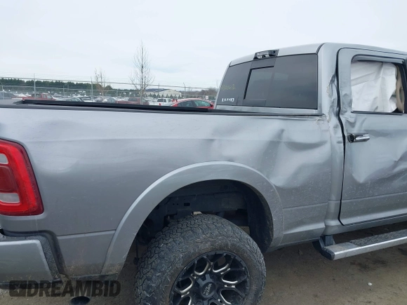 2022 Ram 2500 Laramie with VIN 3C6UR5FL8NG283134, listed as a IAAI auction lot 41300612 with 67,307 mi miles. Bid and sale history available at carsss.com. Image 6.