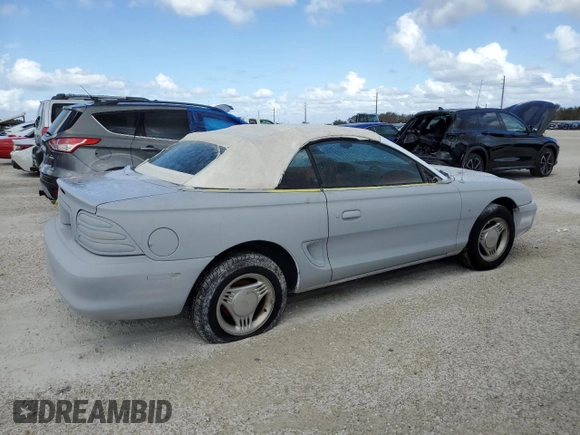1995 Ford Mustang with VIN 1FALP4444SF177184, listed as a Copart auction lot 78695874 with 119,729 mi miles and Salvage title. Bid and sale history available at DreamBid. Image 3.