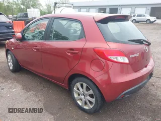 2014 Mazda 2 Touring z VIN JM1DE1LY2E0177294, wystawiony jako IAAI lot #42192006 z przebiegiem 149 668 mil mil oraz . Historia ofert i sprzedaży dostępna na DreamBid. Obrazek 3.