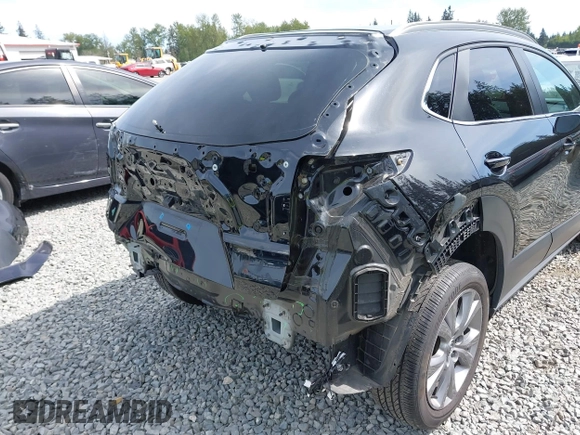 2023 Mazda CX-30 S Carbon Edition with VIN 3MVDMBCM3PM562447, listed as a IAAI auction lot 42174280 with 22,028 mi miles and . Bid and sale history available at DreamBid. Image 6.