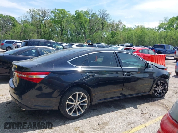 2013 Toyota Avalon XLE with VIN 4T1BK1EB3DU015055, listed as a IAAI auction lot 42086950 with 102,652 mi miles and . Bid and sale history available at DreamBid. Image 14.
