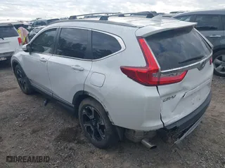 2019 Honda CR-V Touring with VIN 2HKRW1H90KH505234, listed as a IAAI auction lot 41152731 with 107,293 mi miles. Bid and sale history available at carsss.com. Image 3.