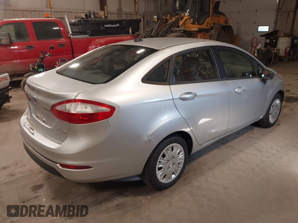 2014 Ford Fiesta S with VIN 3FADP4AJ8EM127214, listed as a IAAI auction lot 42734989 with 141,740 mi miles and . Bid and sale history available at DreamBid. Image 4.