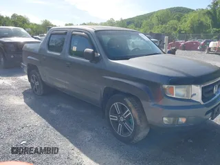 2009 Honda Ridgeline RTL with VIN 2HJYK16539H503533, listed as a IAAI auction lot 42307300 with 206,102 mi miles and . Bid and sale history available at DreamBid. Image 1.