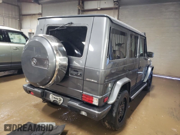 2005 Mercedes-Benz G with VIN WDCYR71E65X160243, listed as a Copart auction lot 48140075 with 164,457 mi miles and Salvage Title. Bid and sale history available at DreamBid. Image 3.