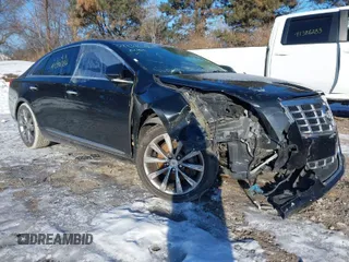 2013 Cadillac XTS Luxury with VIN 2G61P5S36D9215952, listed as a IAAI auction lot 41346386 with 172,491 mi miles. Bid and sale history available at carsss.com. Image 1.